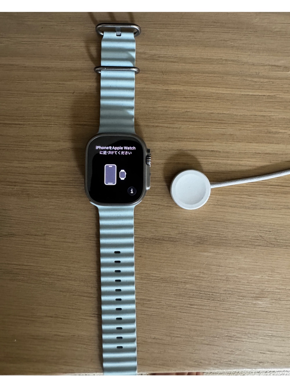 Apple Watch Ultra 2 with Light Blue Sport Loop Band and Magnetic Charging Cable